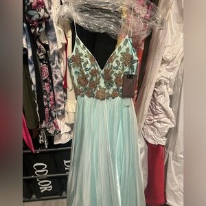 Light blue mac duggal with colorful rhinestones